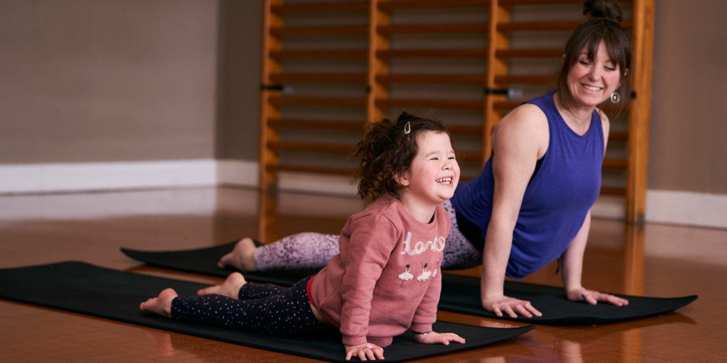 women and child yoga